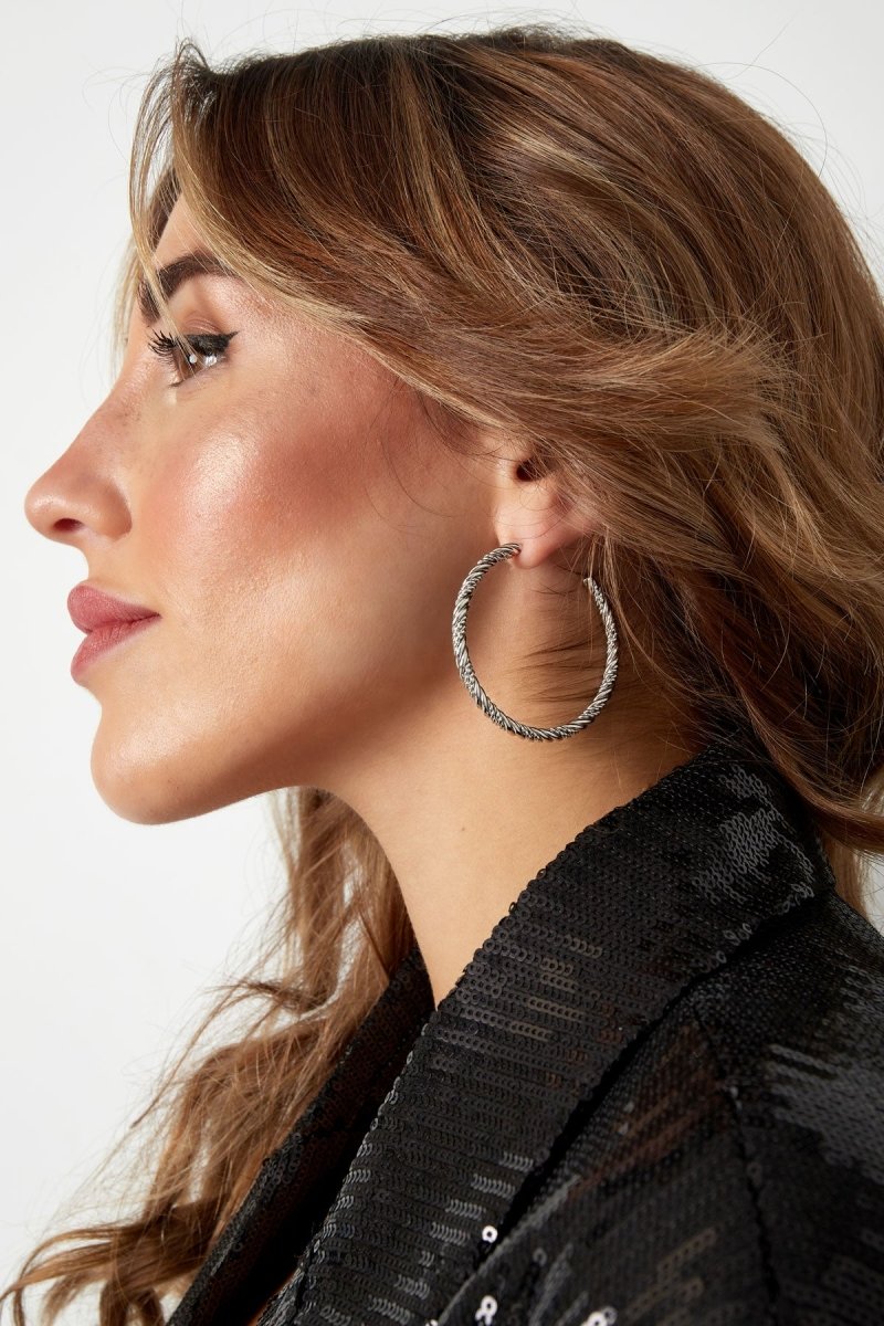 Twisted Hoop Large Oorbellen Goudkleurig