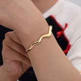 Simple Wave Bangle Armband Goudkleurig