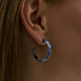 Loop Mare Oorbellen Zilverkleurig