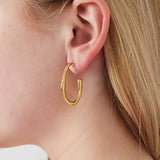 Endless Hoop Clip Oorbellen Goudkleurig