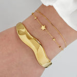 Wavy Bangle Armband Goudkleurig