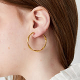Twisty Hoops Clip Oorbellen Goudkleurig