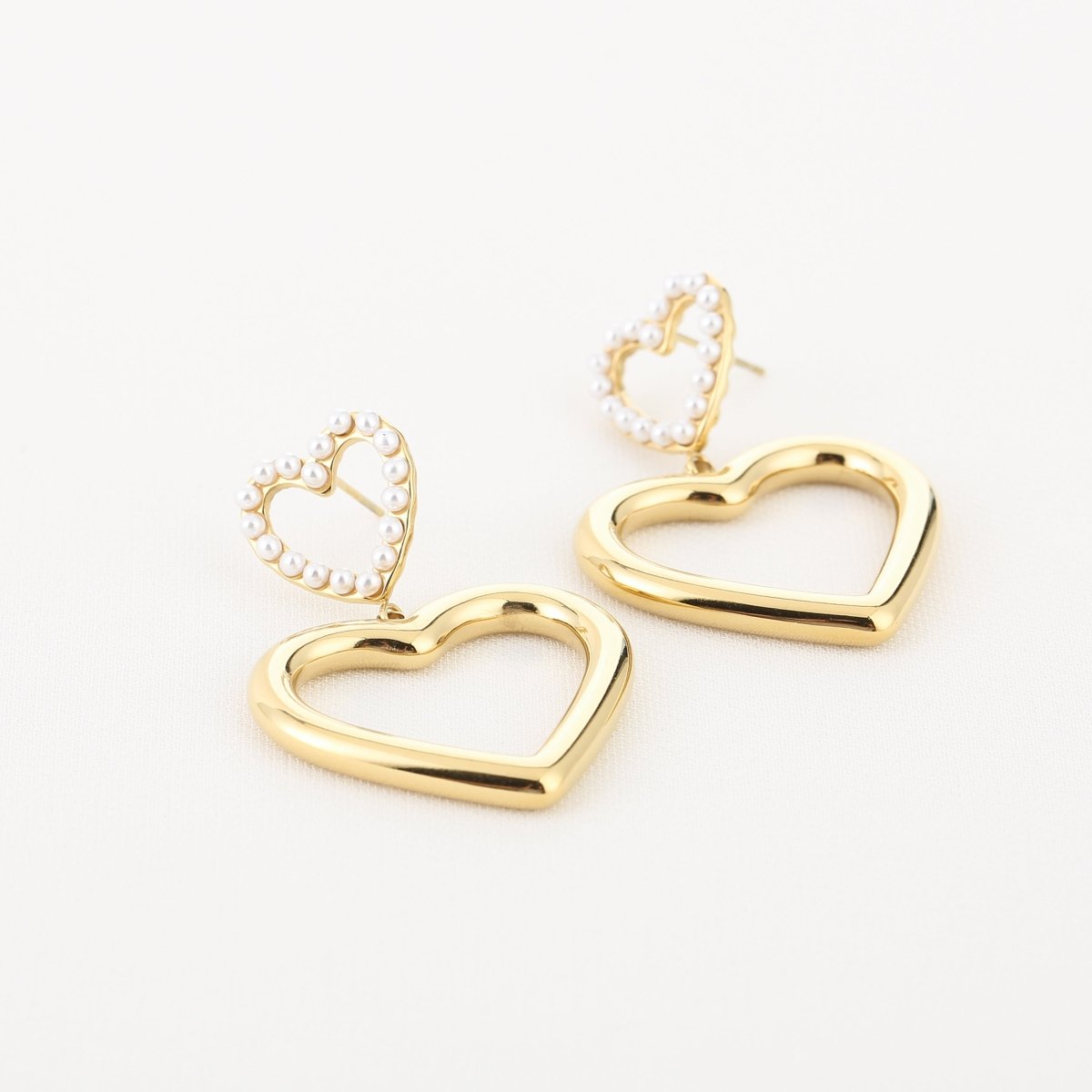 Double Heart & Pearls Oorbellen Goudkleurig