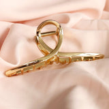 Haarklem Elegant Swirl Goudkleurig